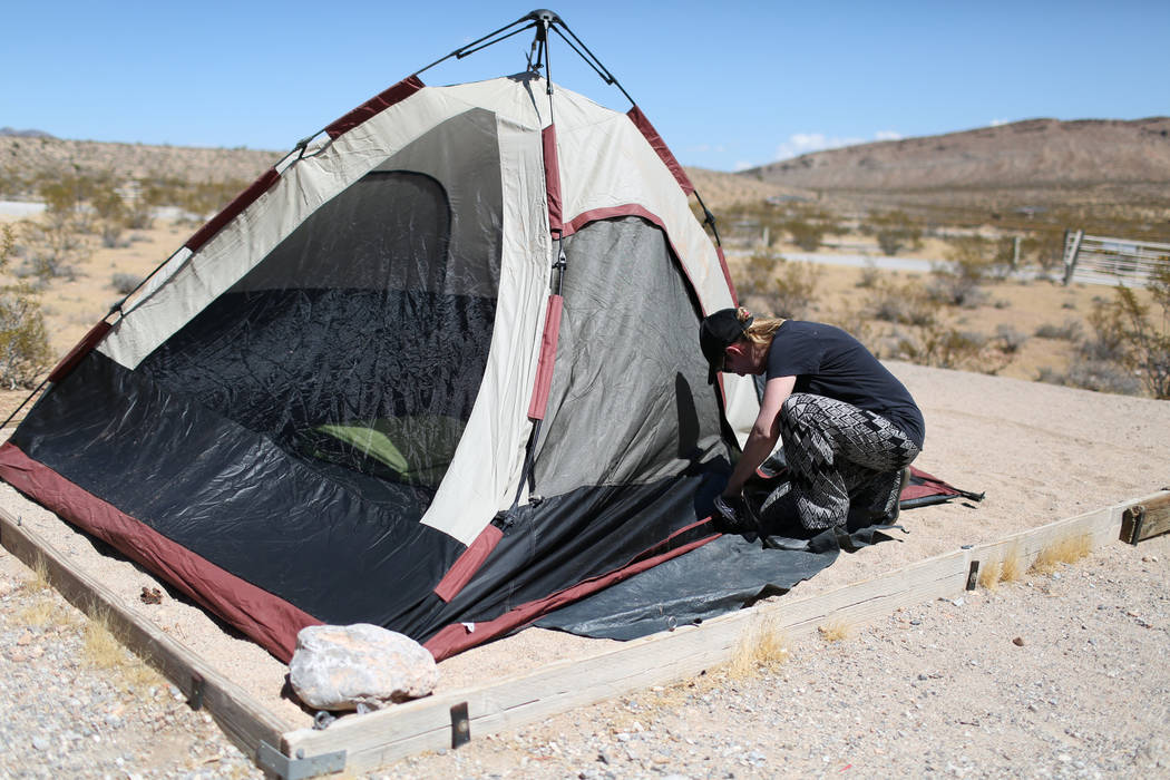Tara Charter, 53, zips up her tent at Red Rock Canyon Campground in Las Vegas on Friday, Sept. 2, 2016. The campground, very popular with rock climbers, opened Friday and will be open through Memo ...