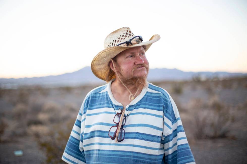 Homeless resident Timothy Persson, 60, poses for a portrait outside of his trailer in Pahrump, ...
