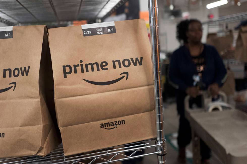 Prime Now customer orders are ready for delivery at the Amazon warehouse in New York, Dec. 20, ...