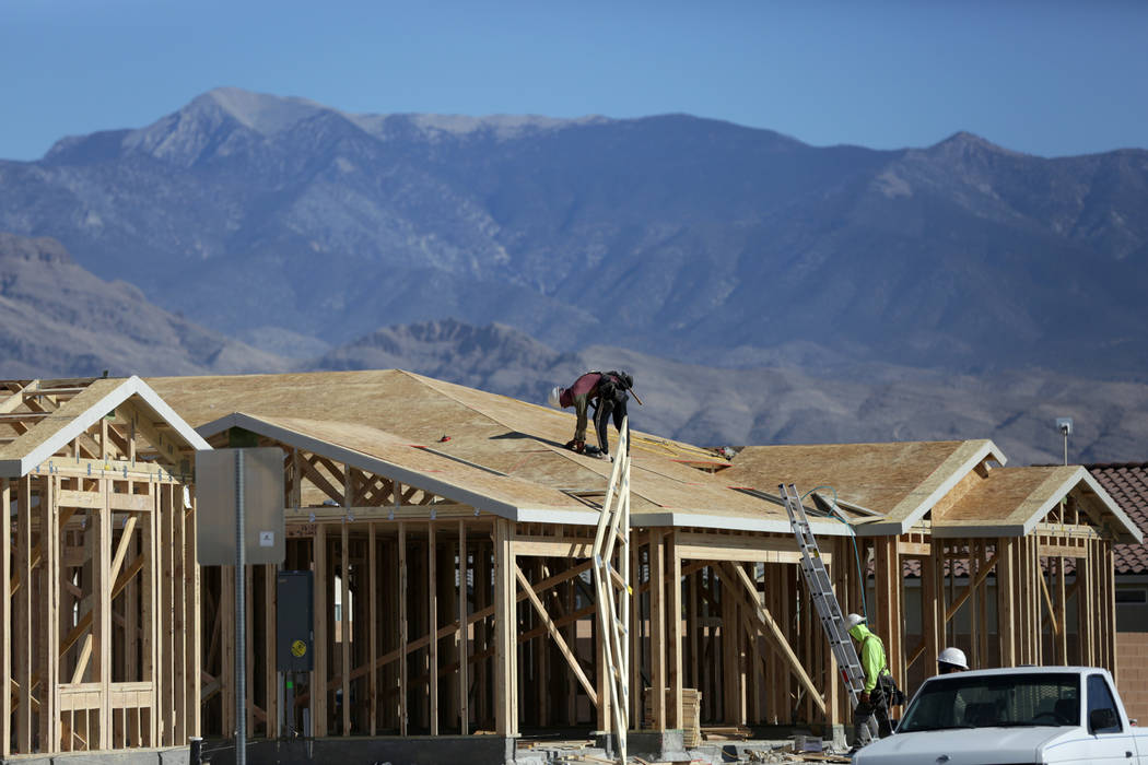 Construction crews work to complete homes Thursday, Nov. 15, 2018, at Burson Ranch in Pahrump, where developers have restarted the rural housing project. Michael Quine/Las Vegas Review-Journal.com ...