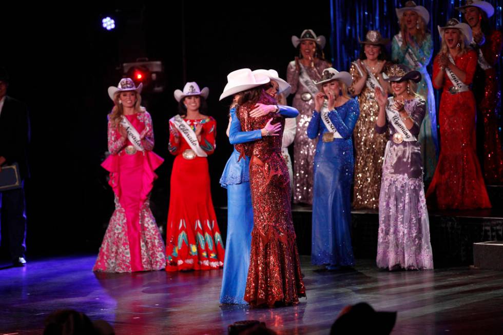 Miss Rodeo Oklahoma Taylor Spears, left, hugs Miss Rodeo Mississippi Taylor McNair as McNair is ...