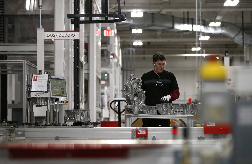 Teakgro Ventra assembles a drive unit at the Tesla Gigafactory, east of Reno, Nev., on Tuesday, Dec. 4, 2018. Cathleen Allison Special to Las Vegas Review-Journal