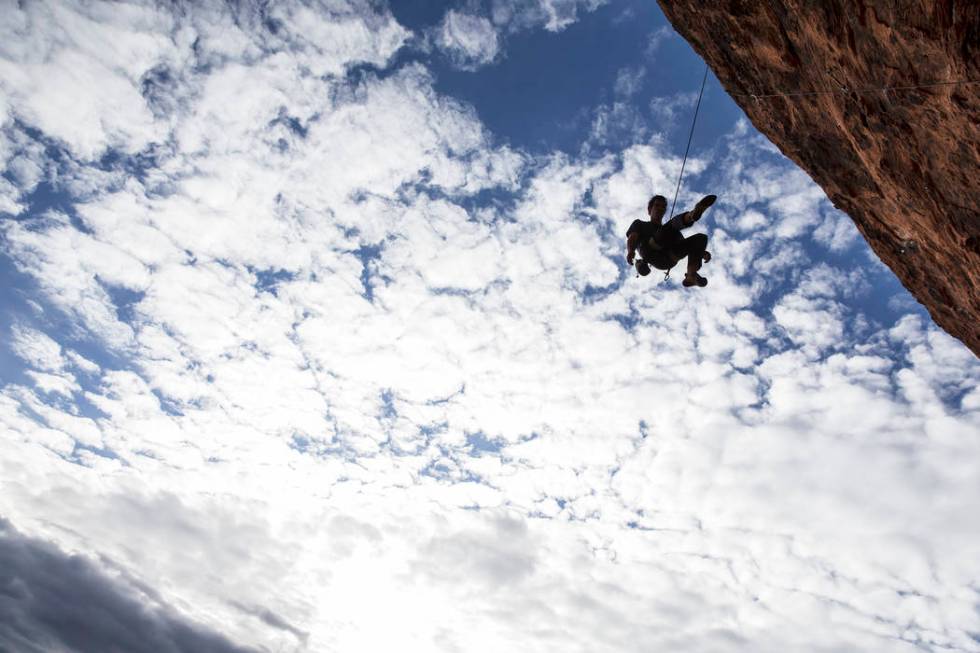 Alex Honnold descends The Gallery at Red Rock Canyon on Monday, Dec. 17, 2018, in Las Vegas. Ho ...