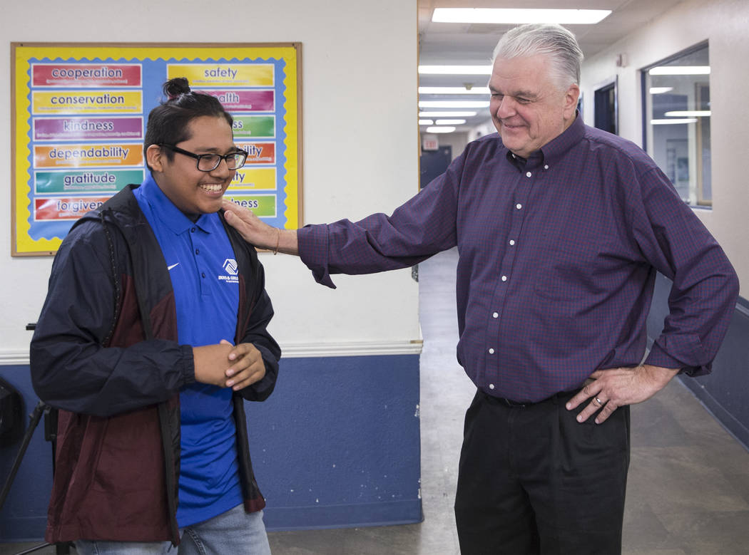 Boys & Girls Clubs ambassador Jose De Dios, left, shares a laugh with governor-elect Steve Sisolak during a visit to the Boys & Girls Clubs of Southern Nevada on Thursday, Jan. 3, 2019, in ...