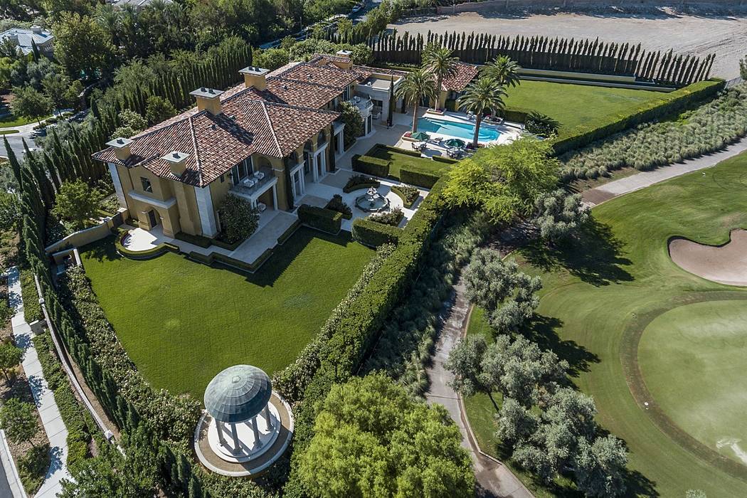 The mansion at 1717 Enclave Court in Las Vegas, seen above, sold for $13 million in March 2018. (Queensridge Realty)