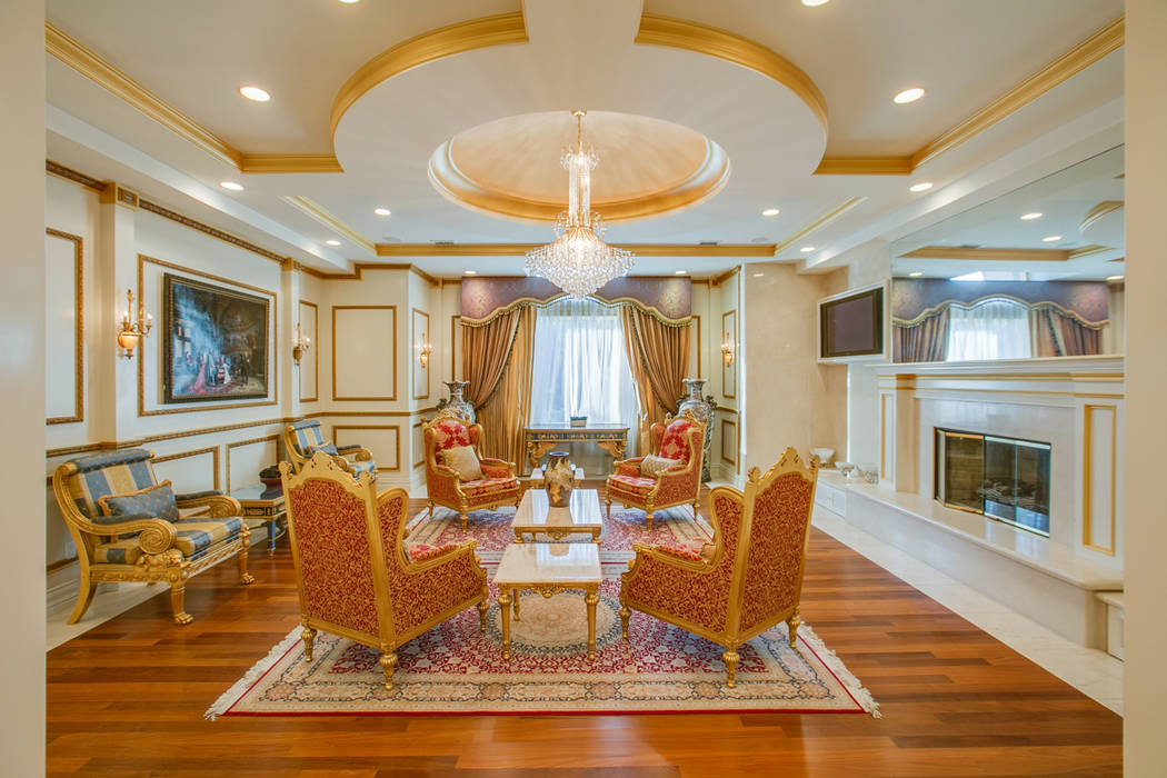 The interior of the mansion at 9009 Greensboro Lane in Las Vegas is seen above. The home was formerly owned by Edwin Fujinaga, who was convicted in November of running a $1.5 billion Ponzi scheme. ...