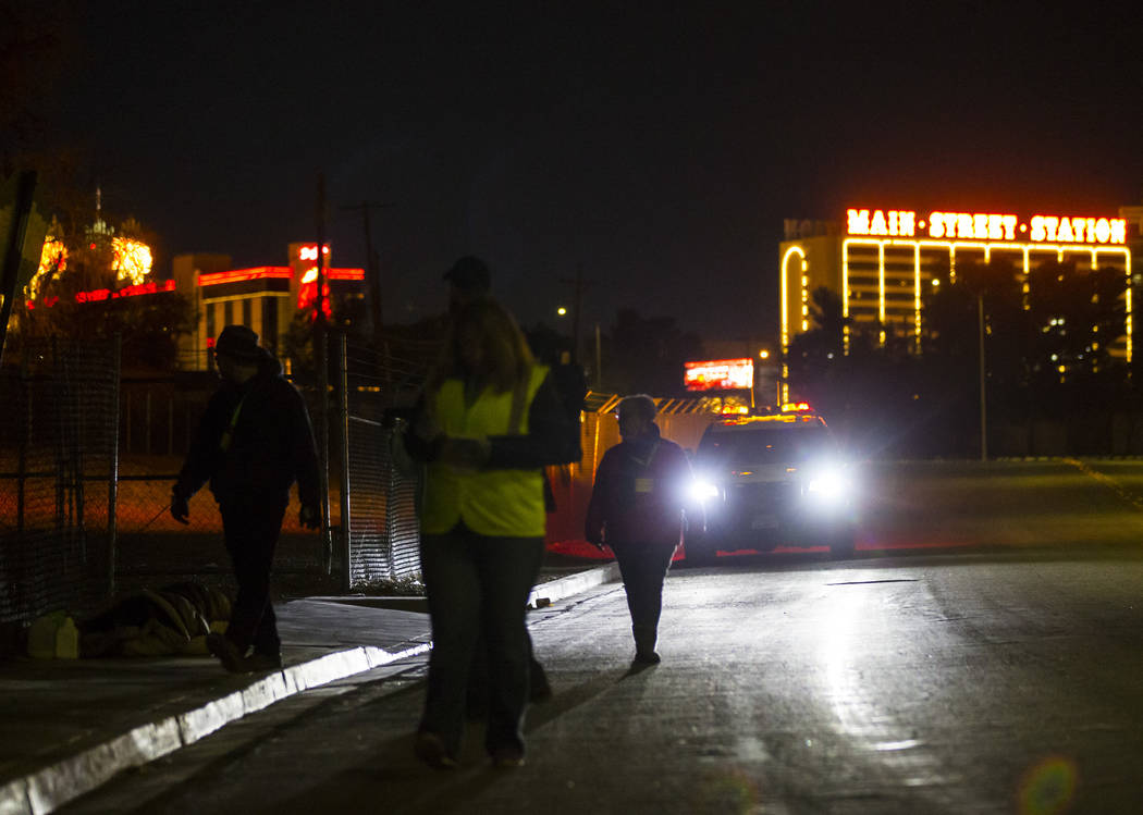 Volunteers look for homeless people along Veterans Memorial Drive during the annual Southern Ne ...