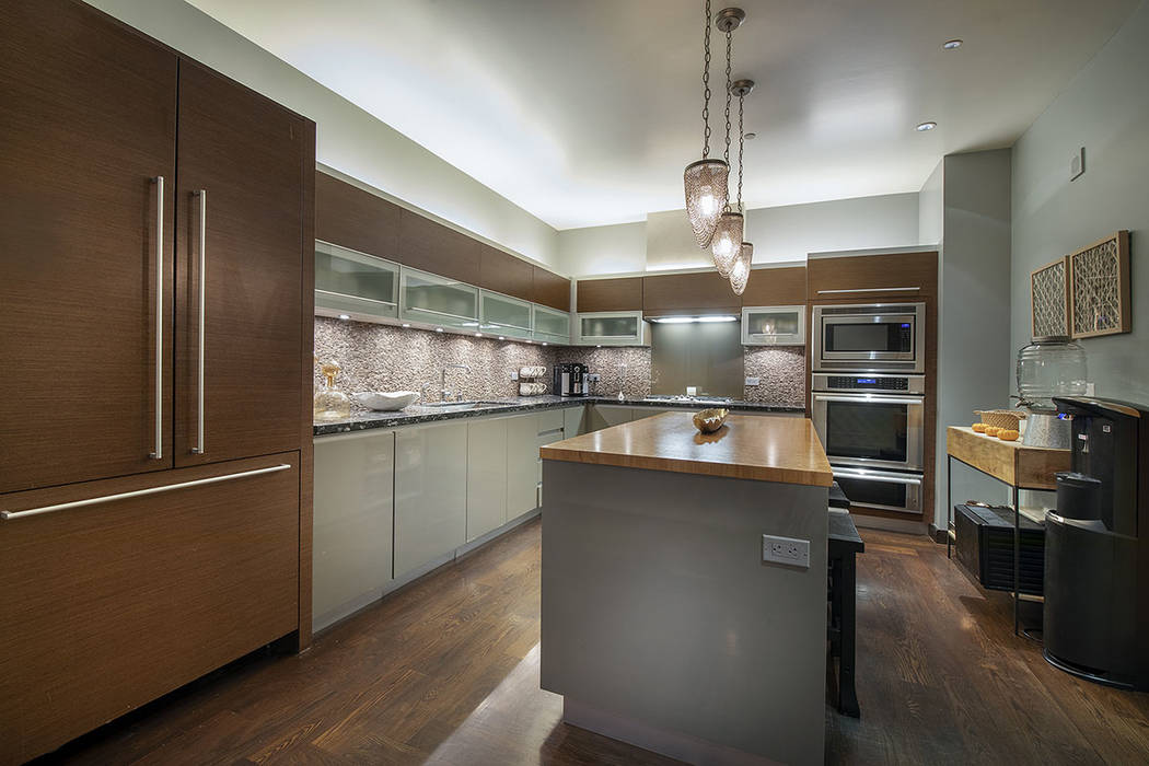 The kitchen in unit 4504 in Waldorf Astoria is modern. (Acclaim)