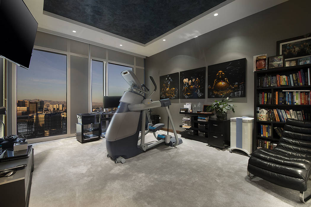 The gym in unit 4504 in Waldorf Astoria has a view of the Strip. (Acclaim)