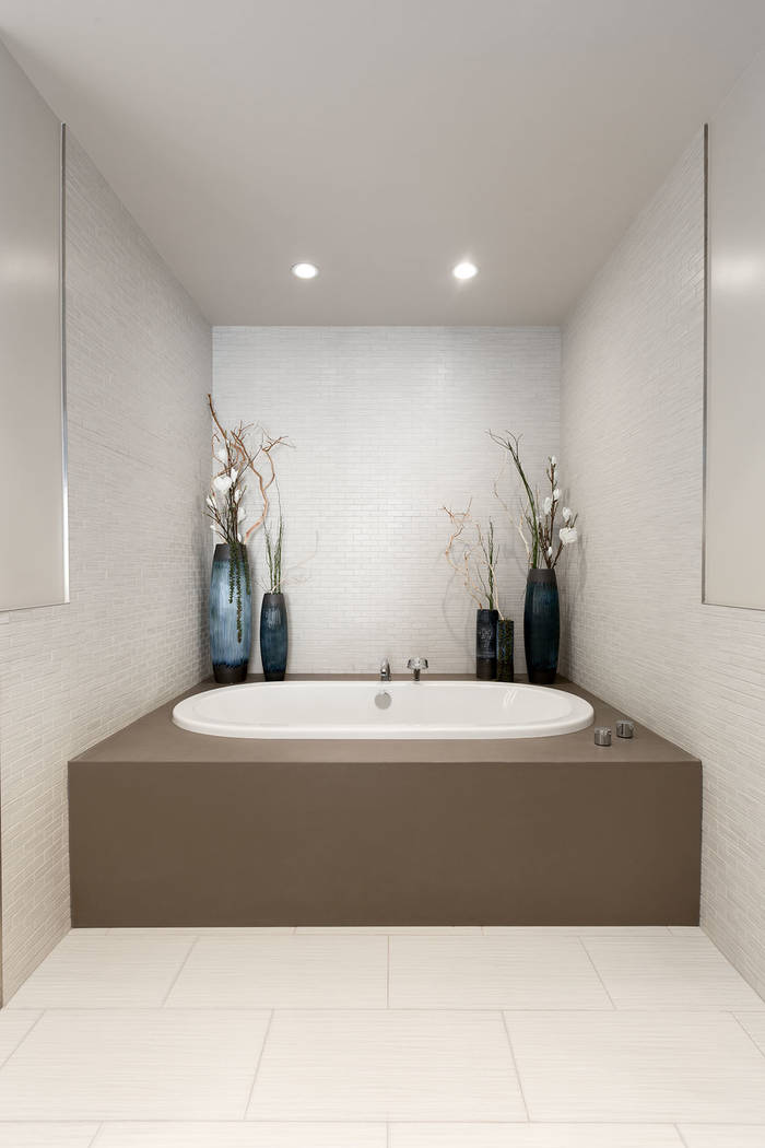 The master bath in Waldorf Astoria unit No. 2403 has a large tub. (Luxury Estates International)
