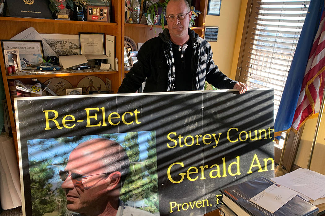 Storey County Sheriff Gerald Antinoro in his Virginia City office with one of his re-election campaign signs. An ethics complaint against him says the sign is among several campaign materials that ...