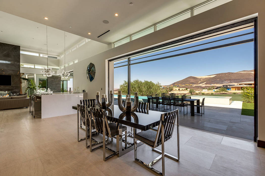The modern design includes outdoor-indoor living features. (Ivan Sher Group)