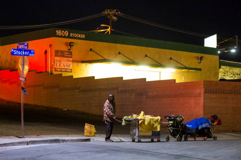 A homeless man moves his belongings along Stocker Street at Owens Avenue during the annual Southern Nevada Homeless Census in Las Vegas on Tuesday, Jan. 22, 2019. (Chase Stevens/Las Vegas Review-J ...