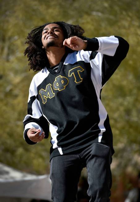 Evan Harris of Alpha Men & Divas of Tomorrow performs during the Black History Month Festiv ...