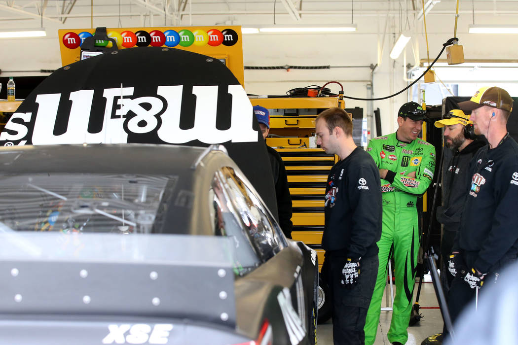 NASCAR driver and Las Vegas native Kyle Busch, center, in his garage during testing at Las Vegas Motor Speedway Thursday, Jan. 31, 2019. (K.M. Cannon/Las Vegas Review-Journal) @KMCannonPhoto