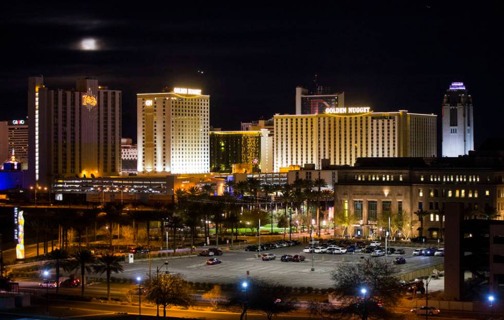 A super snow moon rises over the Plaza in downtown Las Vegas as seen from the World Market Cent ...