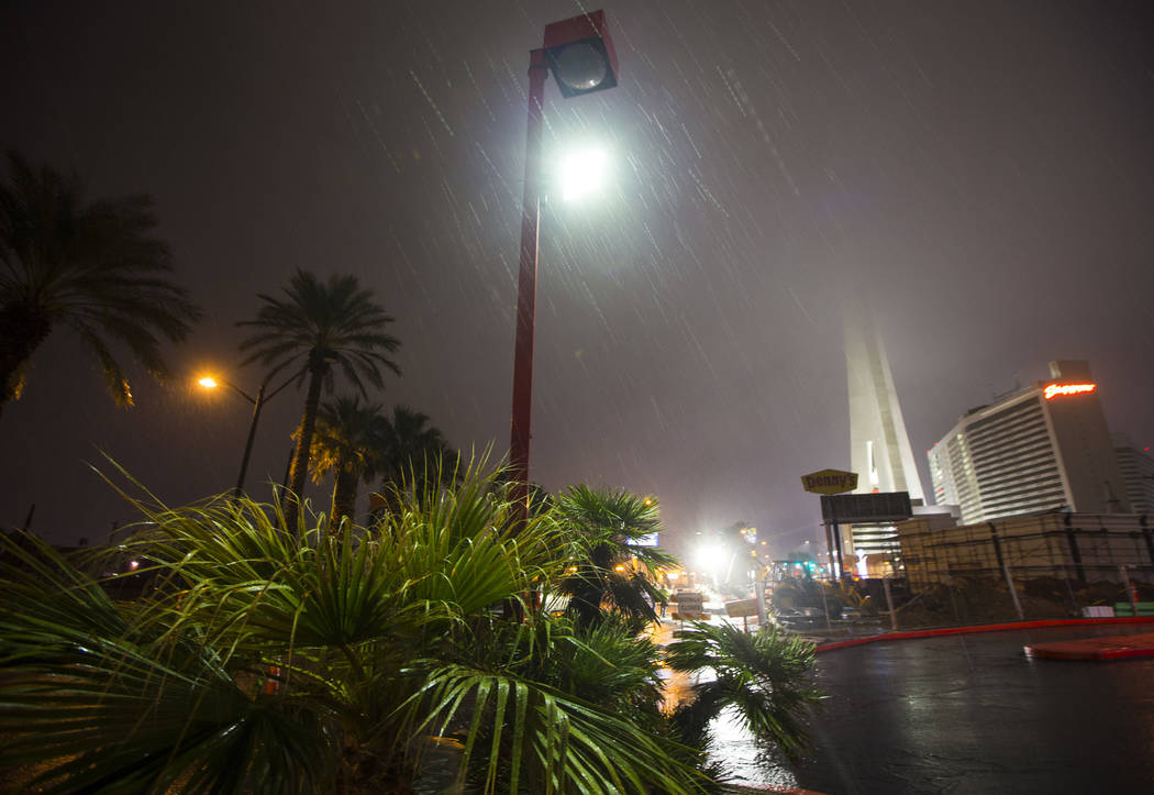 The Strat is obscured in the background as snow falls in Las Vegas on Wednesday, Feb. 20, 2019. (Chase Stevens/Las Vegas Review-Journal) @csstevensphoto