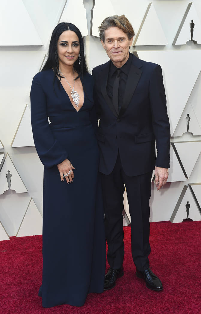 Giada Colagrande, left, and Willem Dafoe arrive at the Oscars on Sunday, Feb. 24, 2019, at the Dolby Theatre in Los Angeles. (Photo by Jordan Strauss/Invision/AP)