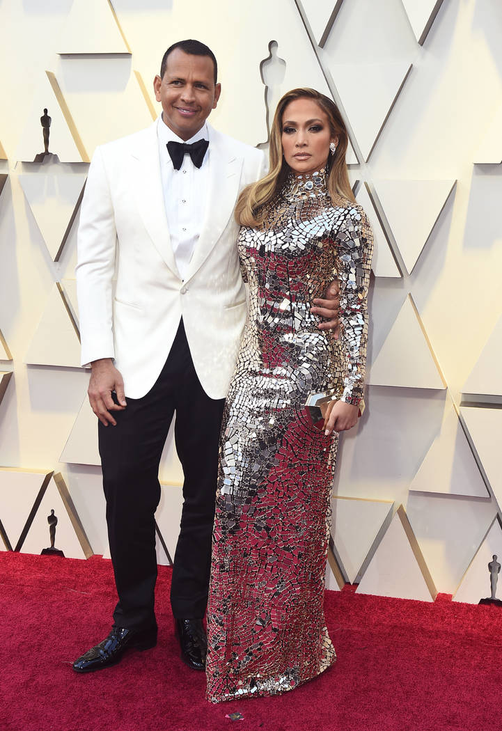 Alex Rodriguez, left, and Jennifer Lopez arrive at the Oscars on Sunday, Feb. 24, 2019, at the Dolby Theatre in Los Angeles. (Photo by Jordan Strauss/Invision/AP)