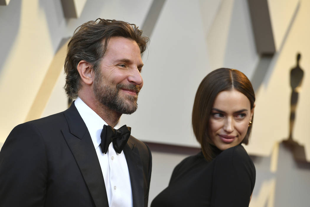 Bradley Cooper, left, and Irina Shayk arrive at the Oscars on Sunday, Feb. 24, 2019, at the Dolby Theatre in Los Angeles. (Photo by Jordan Strauss/Invision/AP)