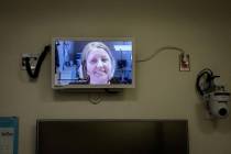 Colleen Hammill, CCRN, calls in via a new telehealth partnership with the VA Midwest Health Care Network's Regional Tele-ICU System as the VA Southern Nevada Healthcare System hosts a ribbon-cutti ...