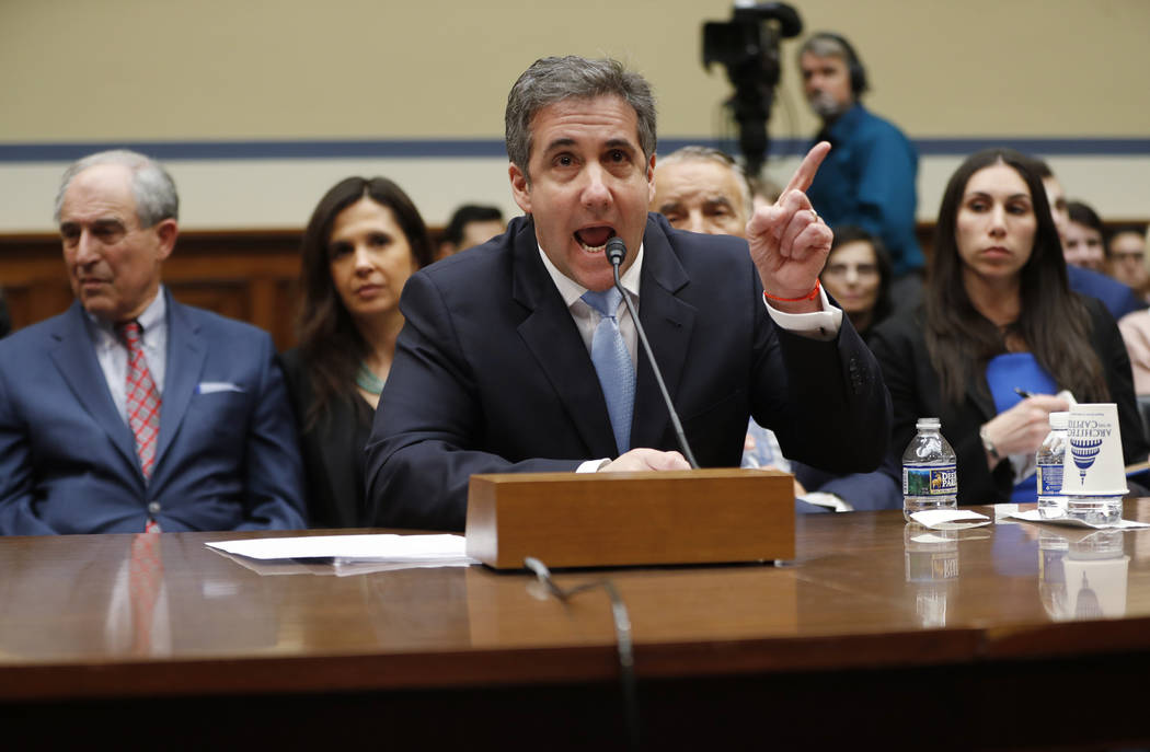 Michael Cohen, President Donald Trump's former personal lawyer, testifies before the House Oversight and Reform Committee on Capitol Hill in Washington, Wednesday, Feb. 27, 2019. (AP Photo/Pablo M ...