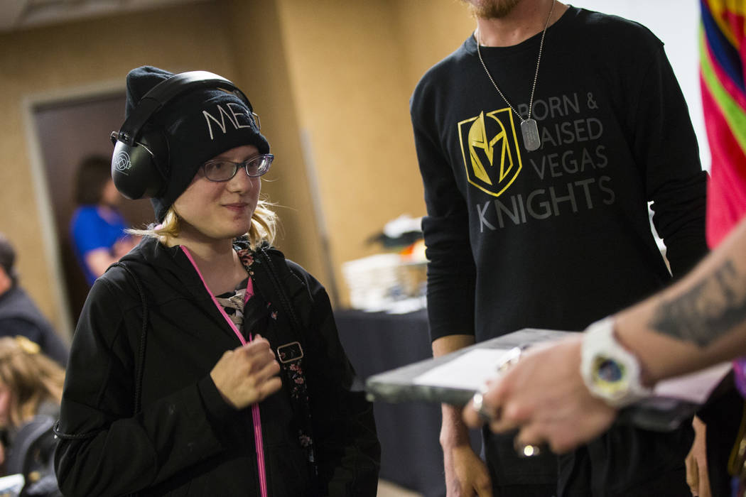 Kristlynn Allison, 11, talks with Daniel Platzman of Imagine Dragons before a hockey game at T-Mobile Arena in Las Vegas on Tuesday, Feb. 26, 2019. (Chase Stevens/Las Vegas Review-Journal) @csstev ...