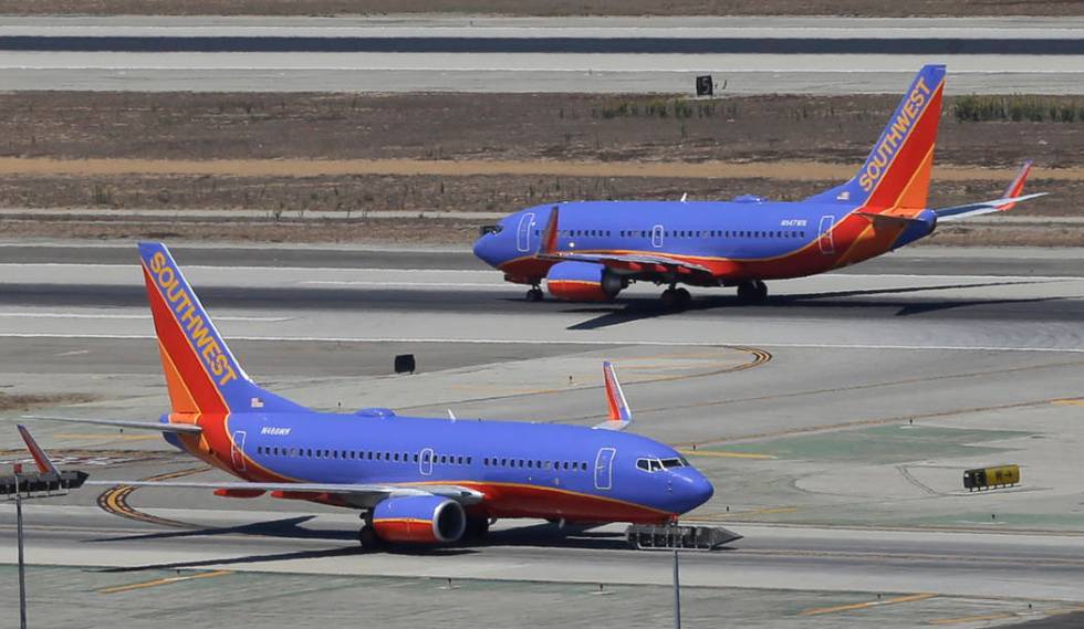 Southwest Airlines says it has gained government approval to begin flights between California and Hawaii, capping a long effort that was delayed by the government shutdown. (AP Photo/Reed Saxon, File)