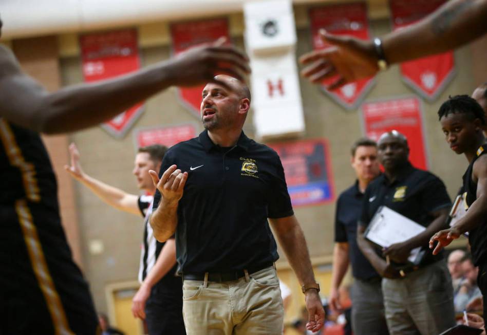 Clark head coach Chad Beeten motions to his team during the first half of a Class 4A state boys basketball quarterfinal game against Desert Pines at Arbor View High School in Las Vegas on Wednesda ...