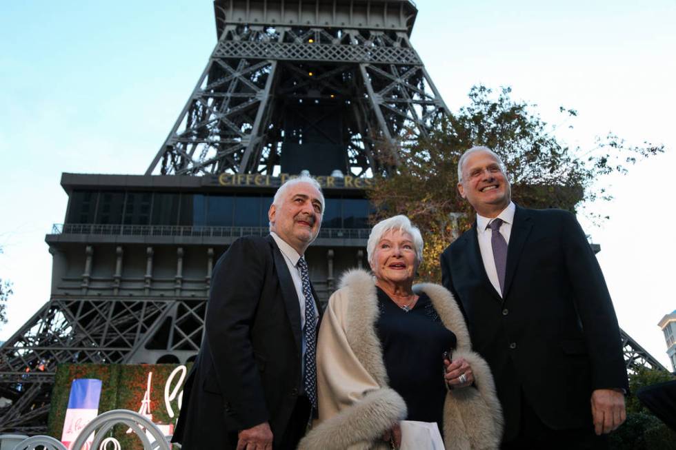 Michelin-starred chef Guy Savoy, French singer and actress Line Renaud and Caesars Corporation President Gary Selesner gather at the Paris Las Vegas as it debuts a new $1.7 million Eiffel Tower li ...