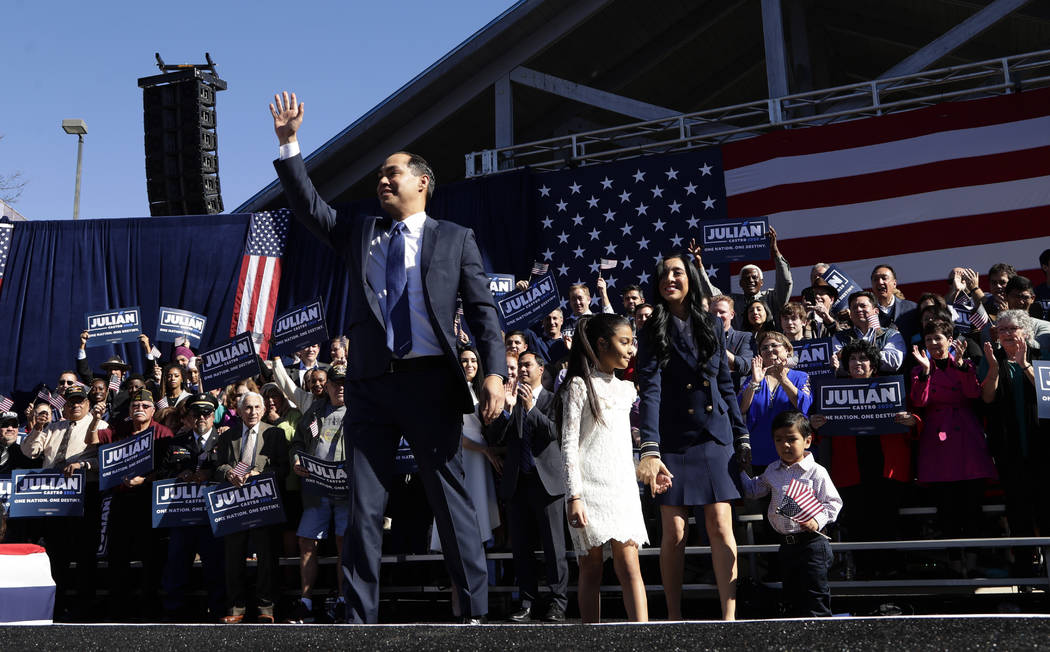 Former San Antonio Mayor and Housing and Urban Development Secretary Julian Castro, front left, waves as he arrives with his family to an event where he announced his decision to seek the 2020 Dem ...