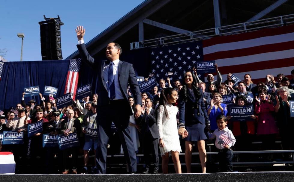 Former San Antonio Mayor and Housing and Urban Development Secretary Julian Castro, front left, waves as he arrives with his family to an event where he announced his decision to seek the 2020 Dem ...