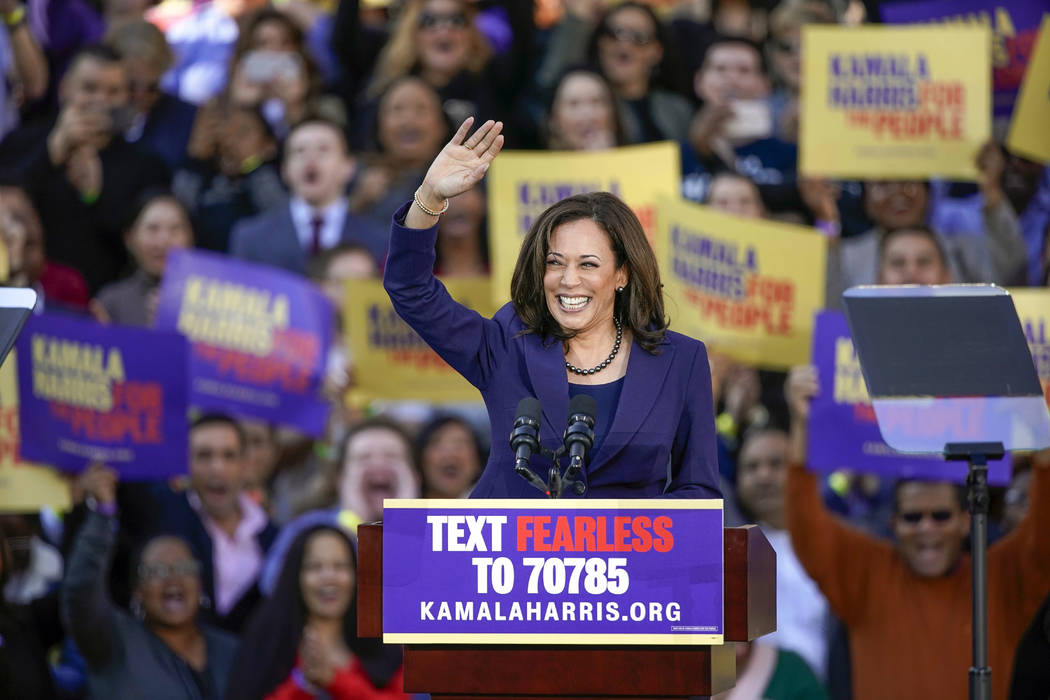 Democratic Sen. Kamala Harris, of California, waves to the crowd as she formally launches her presidential campaign at a rally in her hometown of Oakland, Calif., Sunday, Jan. 27, 2019. (Tony Avel ...