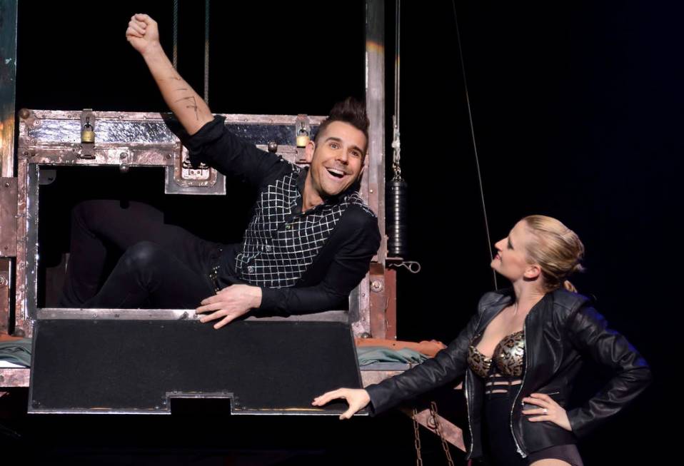 Jan Rouven, left, performs with cast member Sarah Vose during "The New Illusions" at the Tropicana Las Vegas on the Strip on March 11, 2015. (Bill Hughes/Las Vegas Review-Journal)