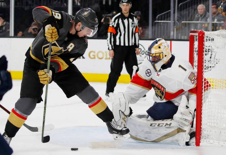 Vegas Golden Knights right wing Reilly Smith (19) scores on Florida Panthers goaltender Roberto Luongo (1) during the second period of an NHL hockey game Thursday, Feb. 28, 2019, in Las Vegas. (AP ...