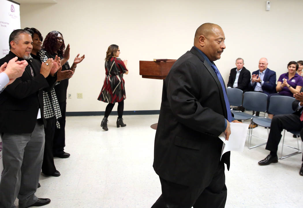 Attendees applaud after John Bontemps received his certificate during the Renewing HOPE graduation for homeless who spend nine months in Catholic Charities program on Thursday, Feb. 28, 2019, in L ...