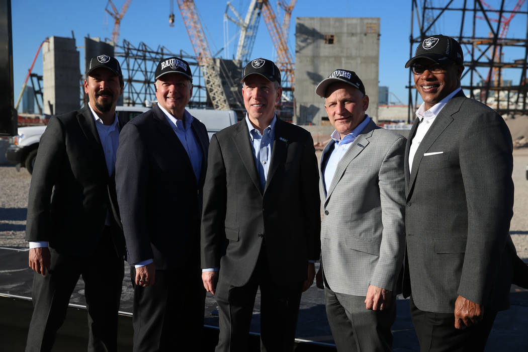 Mark Shearer, from left, Raiders senior vice president, Mike Bolognini, market vice president for Cox Communications Las Vegas, Pat Esser, president of Cox Communications, Marc Badain, president o ...