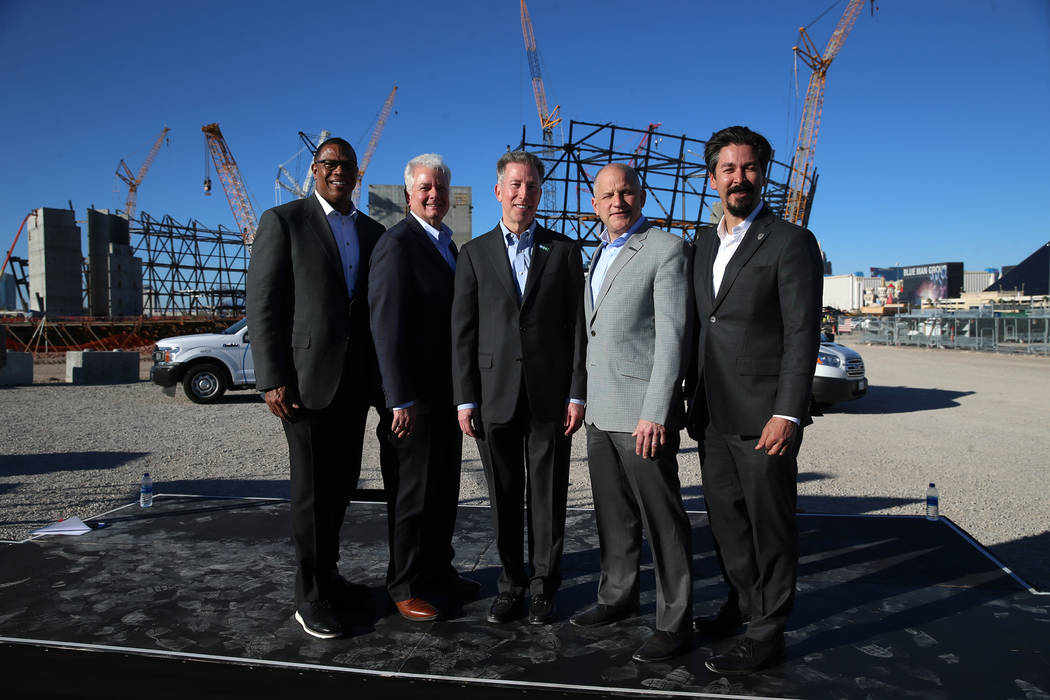 Derrick Hill, from left, vice president for Cox Business, Mike Bolognini, market vice president for Cox Communications Las Vegas, Pat Esser, president of Cox Communications, Raiders president Marc ...