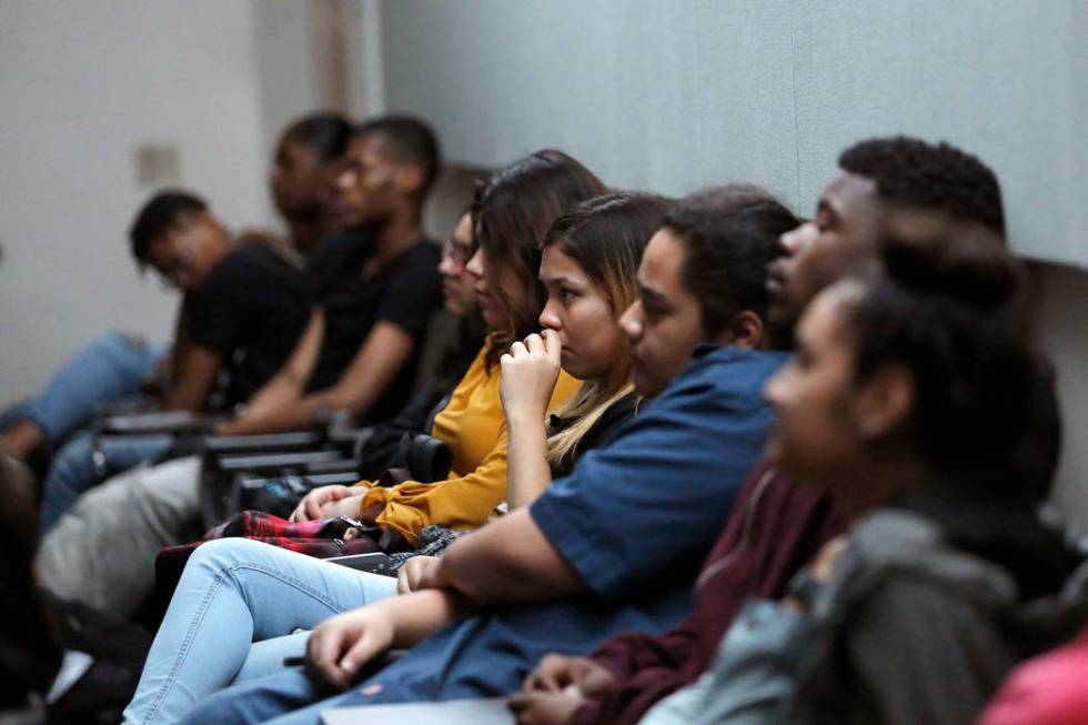 Rancho High School students and guests watch " The Rancho High School Riots,Ӡa documentary film by local filmmaker Stan Armstrong, at Rancho High School in North Las Vegas, Thursday, Fe ...