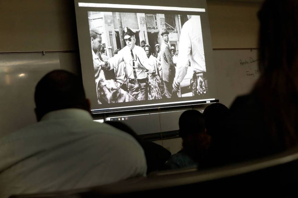 Rancho High School students and guests watch " The Rancho High School Riots,Ӡa documentary film by local filmmaker Stan Armstrong, at Rancho High School in North Las Vegas, Thursday, Fe ...