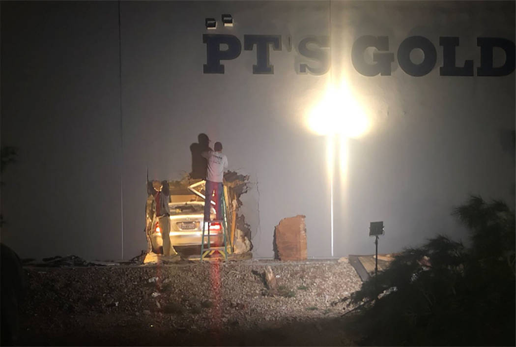 A driver suspected of impairment crashed a vehicle into the wall of a PT’s Gold tavern, at 4880 W. Silverado Ranch Blvd., in Las Vegas on Thursday, Feb. 28, 2019. (Katelyn Newberg/Las Vegas Revi ...