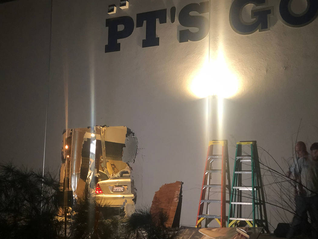 A driver suspected of impairment crashed a vehicle into the wall of a PT’s Gold tavern, at 4880 W. Silverado Ranch Blvd., in Las Vegas on Thursday, Feb. 28, 2019. (Katelyn Newberg/Las Vegas Revi ...