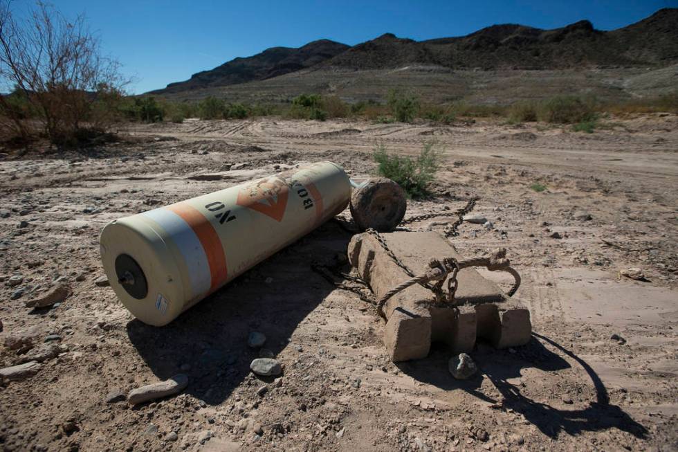 A buoy is seen high and dry near the defunct Echo Bay Marina at Lake Mead National Recreation on Thursday, Sept. 27, 2018. Richard Brian Las Vegas Review-Journal @vegasphotograph