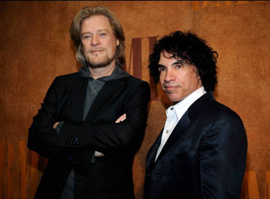 Daryl Hall, left, and John Oates pose together before the 56th annual BMI Pop Awards in Beverly Hills, Calif. on May 20, 2008. (AP Photo/Chris Pizzello, file)