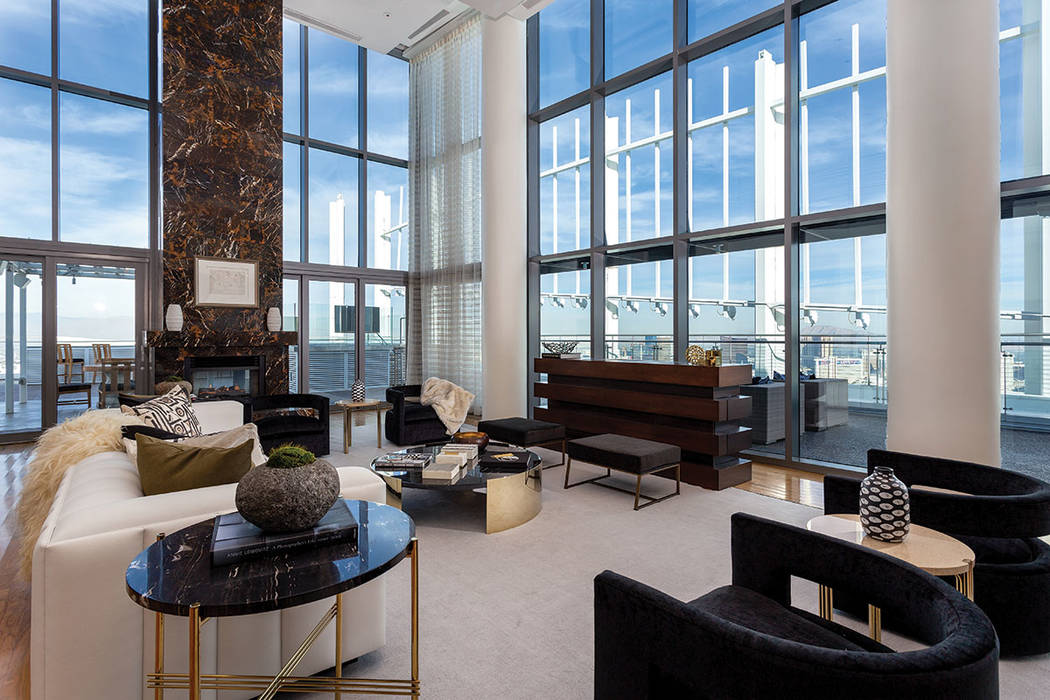 The living room offers floor-to-wall ceilings. (Ivan Sher Group)