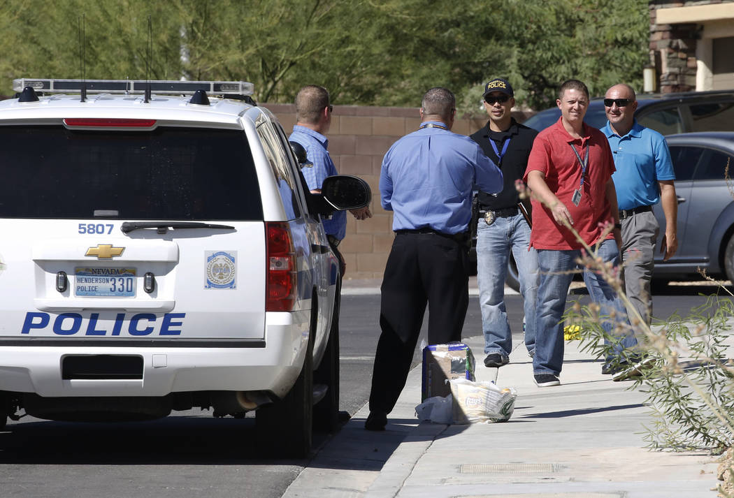 Henderson police investigate an officer-involved shooting at the 1500 block of Point Vista Avenue, near Patrick Lane and Whitney Ranch Drive, on Thursday, Sept. 13, 2018, in Henderson. (Bizuayehu ...