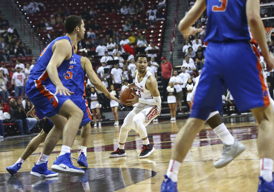 UNLV Rebels guard Noah Robotham (5) brings the ball up court during the first half of a basketball game against Boise State at the Thomas & Mack Center in Las Vegas on Saturday, March 2, 2019. ...