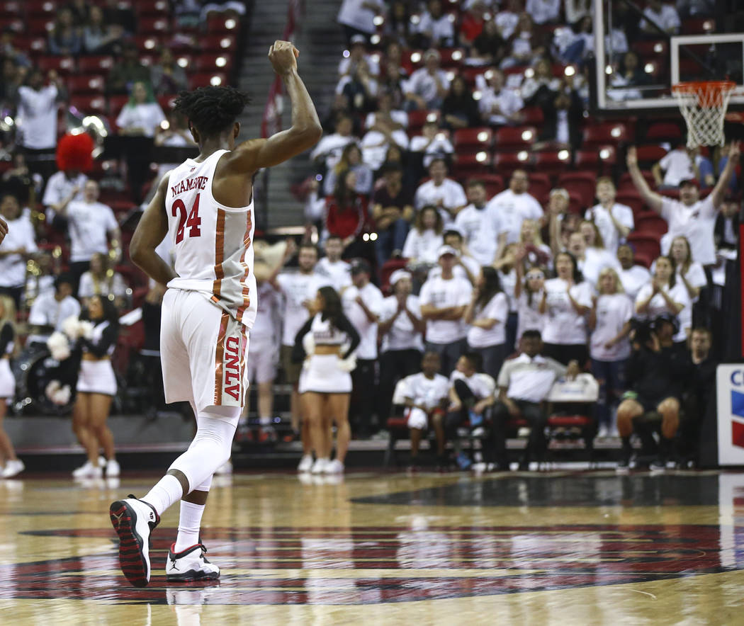 UNLV Rebels forward Joel Ntambwe (24) celebrates a three-point goal during the first half of a basketball game against Boise State at the Thomas & Mack Center in Las Vegas on Saturday, March 2 ...