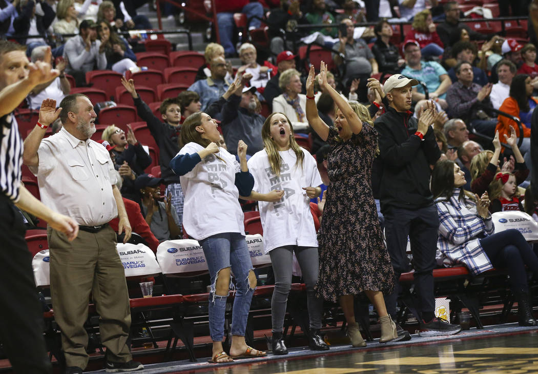 UNLV Rebels fans celebrate a three-point goal during the first half of a basketball game against Boise State at the Thomas & Mack Center in Las Vegas on Saturday, March 2, 2019. (Chase Stevens ...