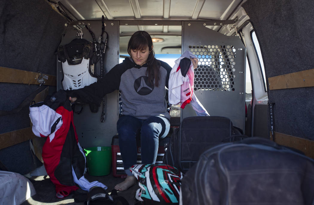 Angie Wright gets her riding clothes on at Western Raceway track outside White Hills, Arizona, Sunday, Feb. 24, 2019. Wright will be racing in the Mint 400's motorcycle race, the first dirt bike r ...